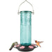 Blue glass hummingbird feeder with pink flowers and two hummingbirds on a white background