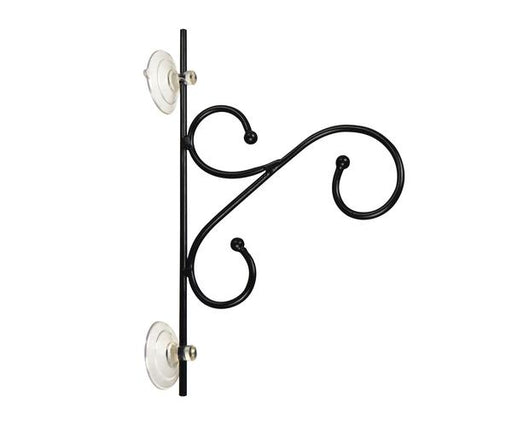 Decorative metal bracket with scroll design on a white background