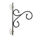 Decorative metal bracket with scroll design on a white background
