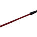 Red eyelash brush with black bristles on a white background