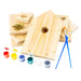Wooden birdhouses with paint cans and brushes on a white background