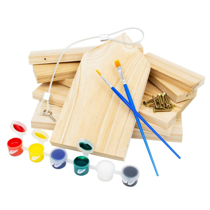 Wooden paint canvases with paint, brushes, and nails on a white background