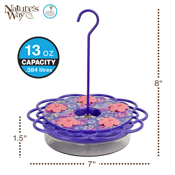 Purple hummingbird feeder with floral design and measurement details on a white background