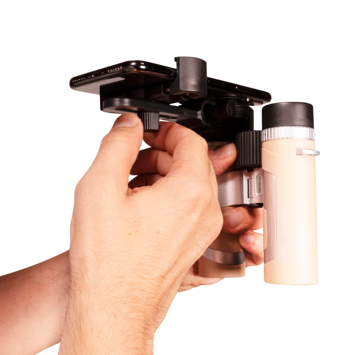 Hand holding a camera stabilizer with a white background