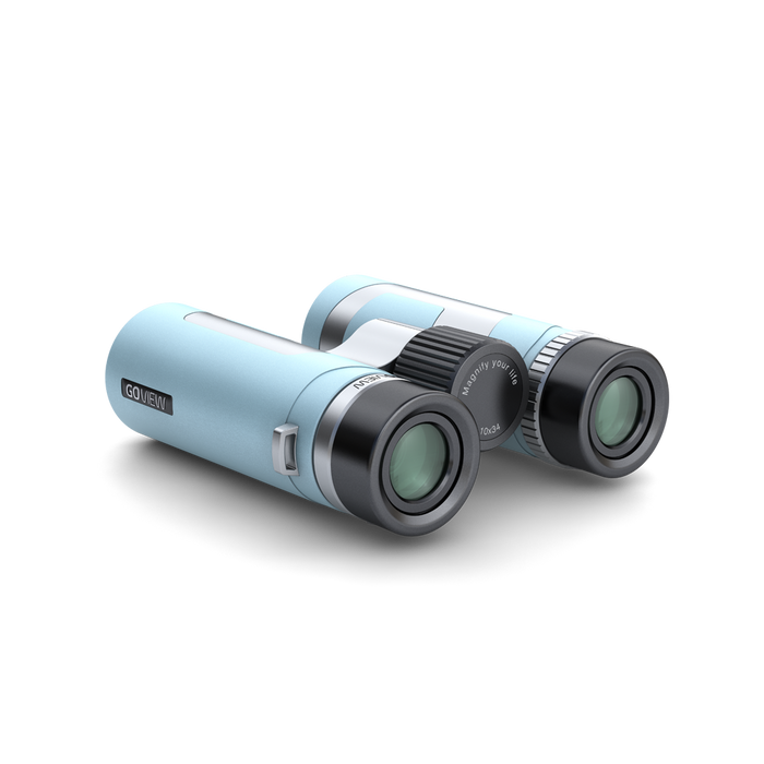 Light blue binoculars with black accents on a white background