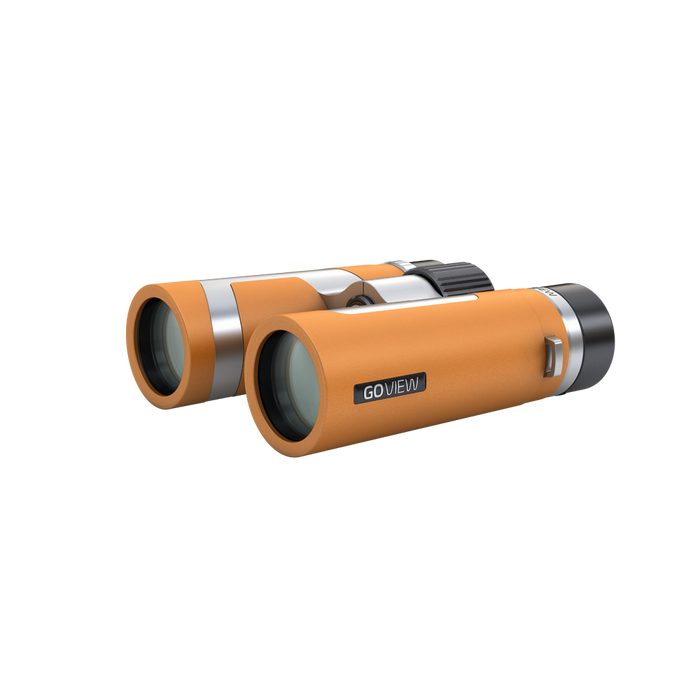 Orange binoculars with silver accents on a white background