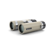 Beige binoculars with silver accents on a white background