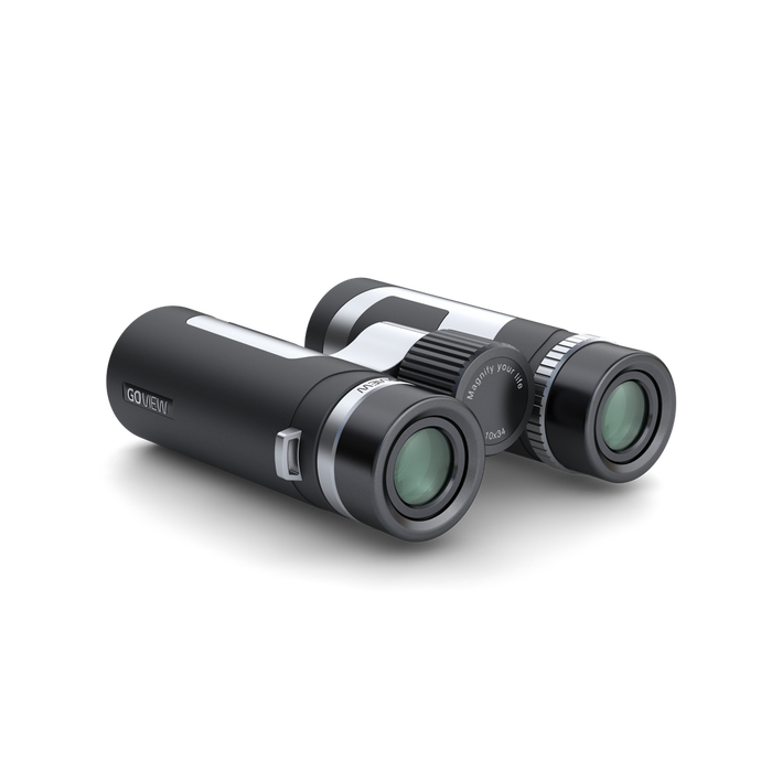 Black binoculars with silver accents on a white background