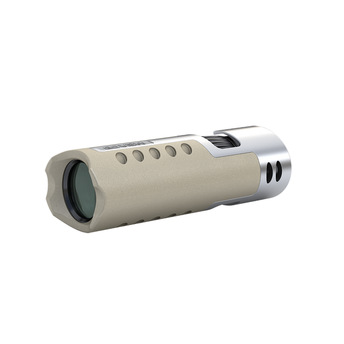 Metallic cylindrical object with cutouts on a white background