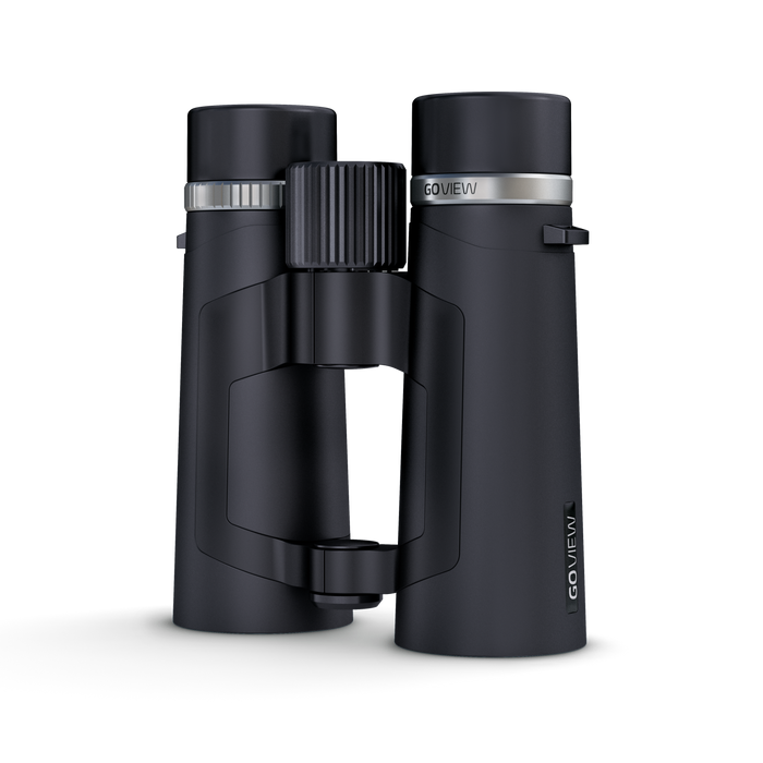 Black binoculars with silver accents on a white background