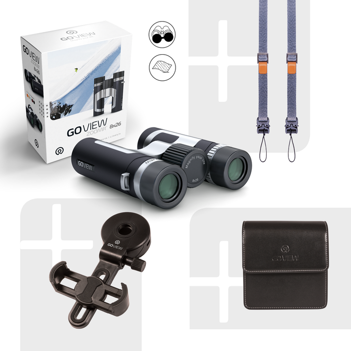 Binoculars with accessories including a case, strap, and clip on a white background