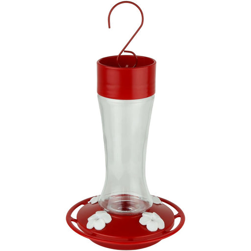 Hummingbird feeder with red top and base on a white background
