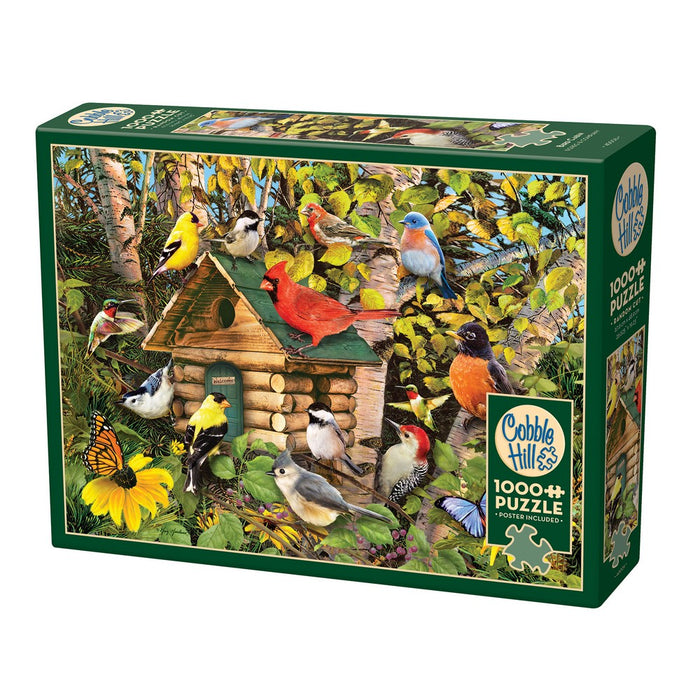 Cobble Hill 1000-piece puzzle box with birdhouse and birds design