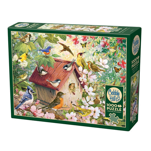 Cobble Hill 1000-piece puzzle box with bird-themed design on a white background