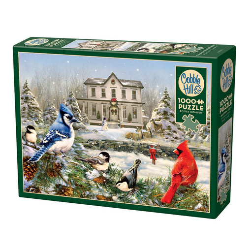 Jigsaw puzzle box featuring a winter scene with birds and a house, brand 'Cobble Hill' visible.