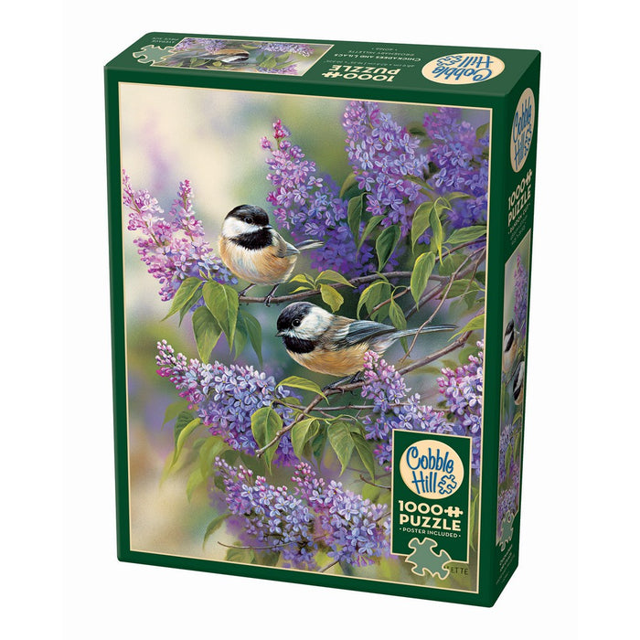 Jigsaw puzzle box featuring birds on a branch with purple flowers, brand 'Cobble Hill' visible.