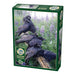 Jigsaw puzzle box with crows and flowers on a white background