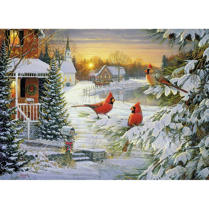 Winter scene with cardinals near a house and church, surrounded by snow and trees.