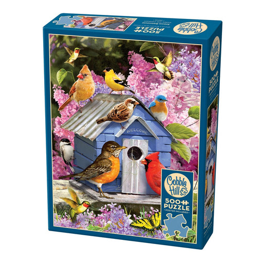 Cobble Hill puzzle box with bird-themed design featuring birds around a birdhouse.