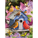 Puzzle of colorful birds around a blue birdhouse with flowers and butterflies in the background