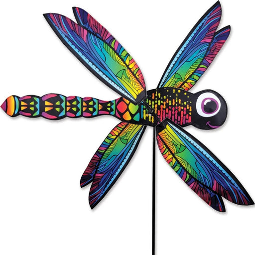 Colorful dragonfly-shaped kite on a white background