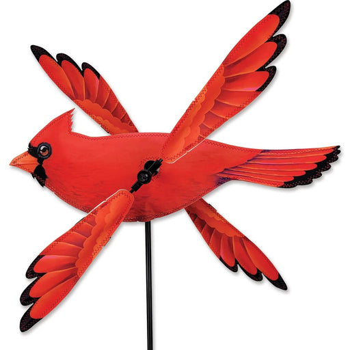 Red cardinal bird sculpture on a white background