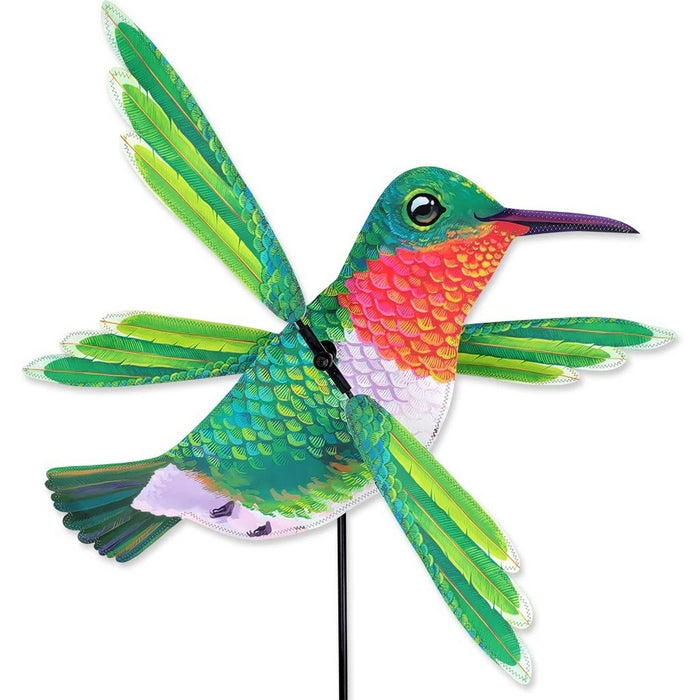 Colorful hummingbird-shaped windmill on a white background