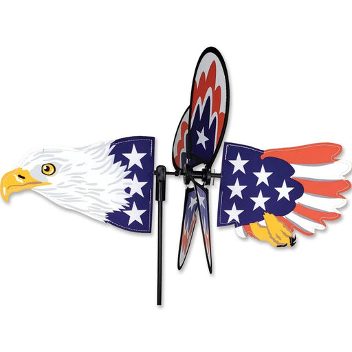 Decorative windmill with eagle and American flag design on a white background