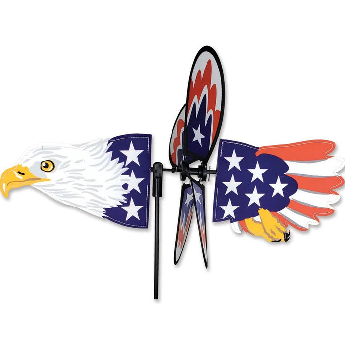 Decorative windmill with eagle and American flag design on a white background