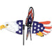 Decorative windmill with eagle and American flag design on a white background