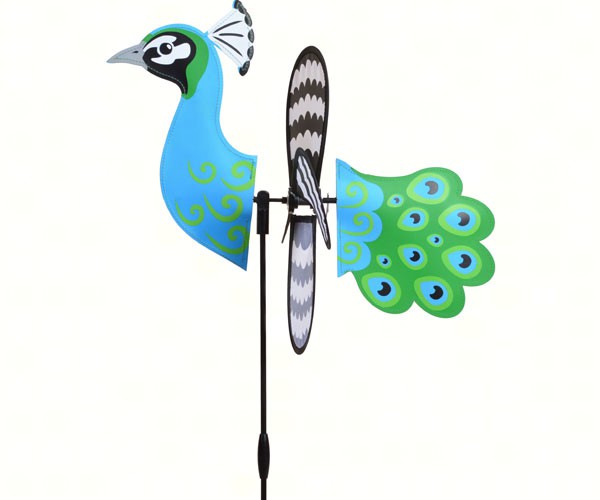 Colorful bird-shaped wind spinner with blue and green design on a white background