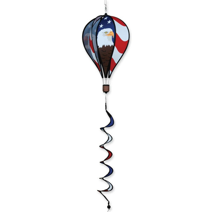 Decorative windsock with American flag design and eagle emblem on a white background