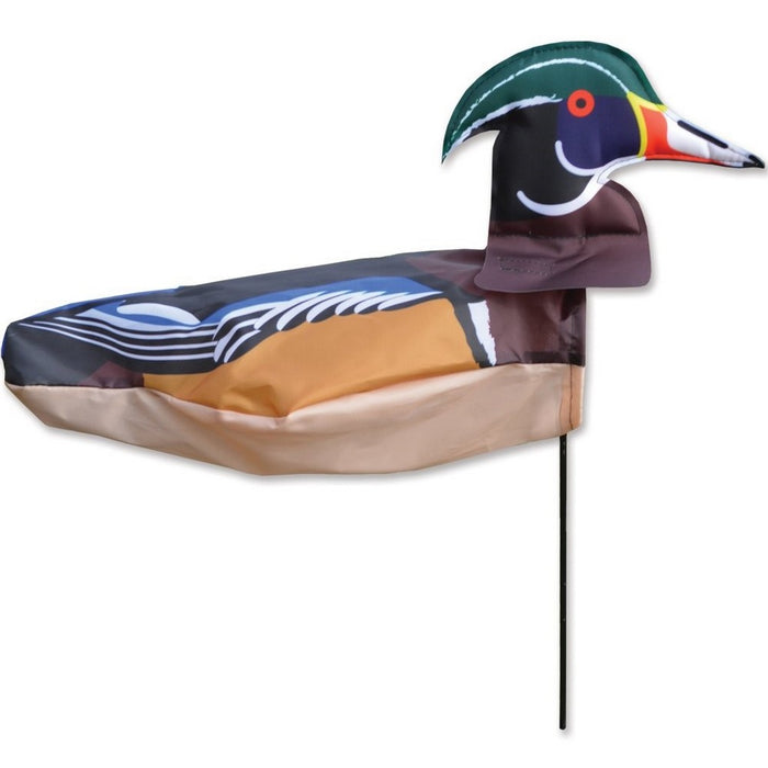 Decorative duck Decoy with colorful plumage on a white background