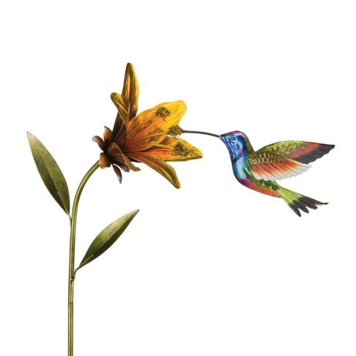 Metallic hummingbird and flower sculpture on a white background