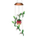 Solar-powered hummingbird and flower wind chime on a white background