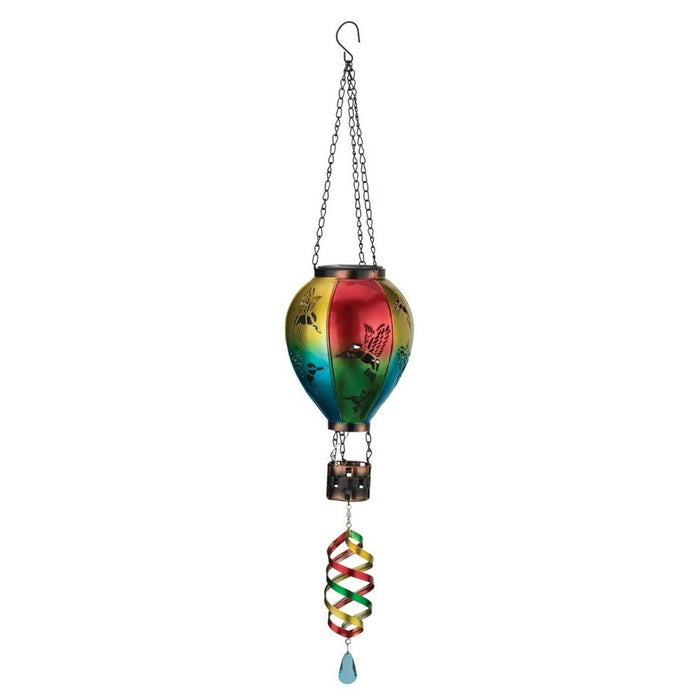Colorful hanging glass ornament with a bird design on a white background