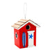 Red birdhouse with wooden roof, blue door, and starfish design on a white background