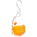 Orange bird feeder with a silver hook on a white background