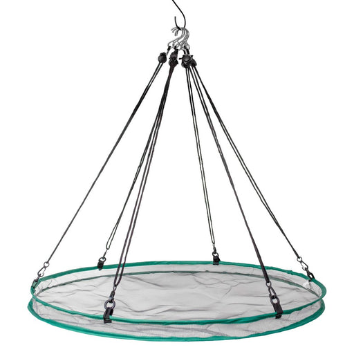 Round netting with green rim and black ropes on a white background