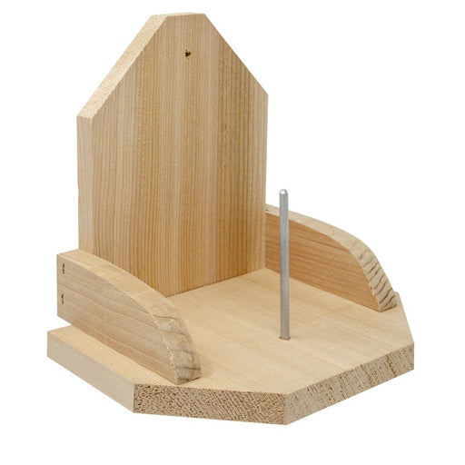 Wooden bird feeder with a metal perch on a white background