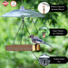 Bird feeder with clear plastic cover and wooden platform, featuring Squirrel Shields branding.