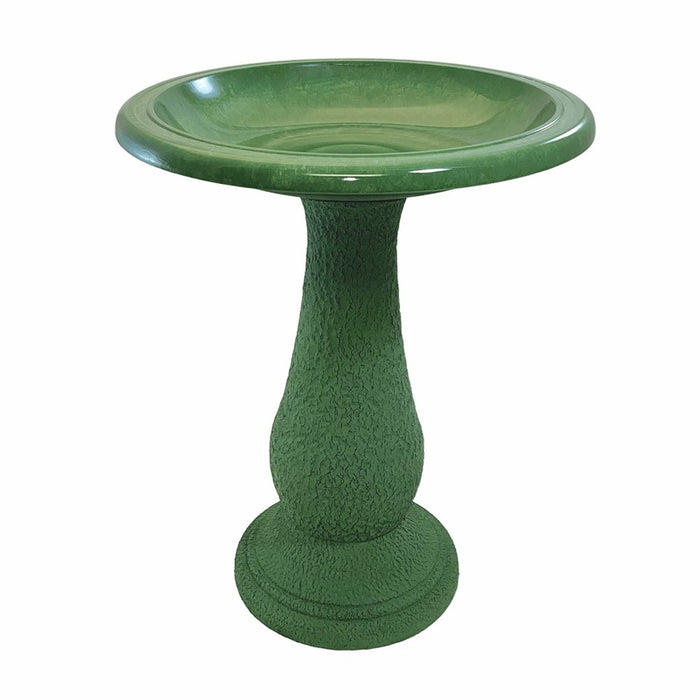Green bird bath on a white background
