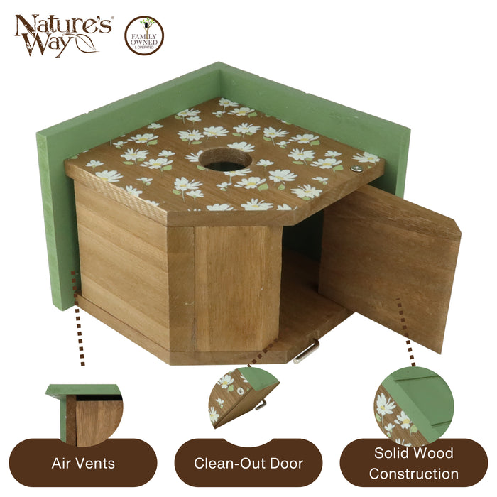 Wooden birdhouse with floral design on a white background, featuring 'Nature's Way' branding.