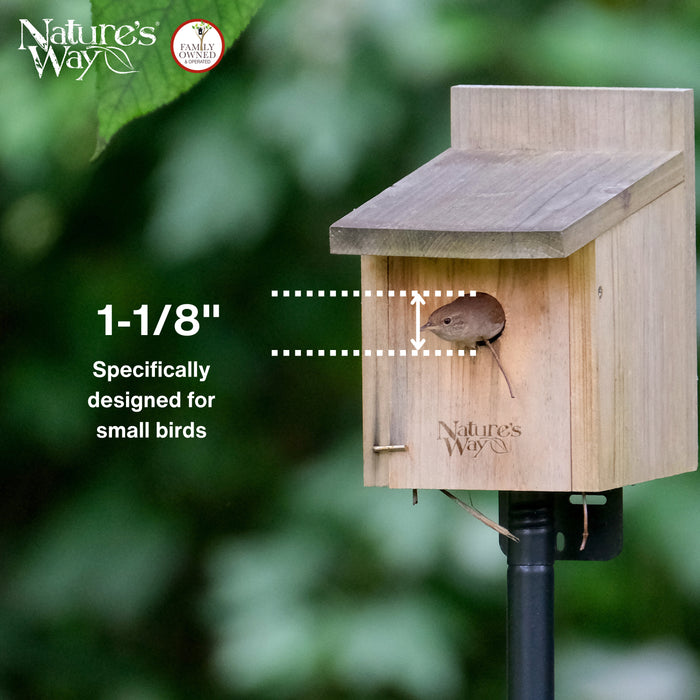 Wooden birdhouse with a small bird perched on it, labeled 'Nature's Way' against a blurred green background.