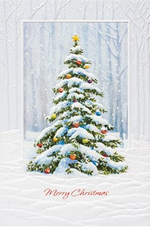 A festive Christmas greeting card featuring a snow-covered evergreen tree with ornaments, set against a snowy winter forest scene with the text 'Merry Christmas' at the bottom.