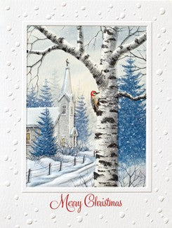 A Christmas greeting card featuring a winter landscape illustration with a birch tree, snow-covered church, evergreen trees, and a small red bird, with the text 'Merry Christmas' at the bottom.