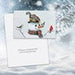 A square greeting card featuring a winter illustration of a child in a snowsuit with a snowman, set against a snowy white and blue background.